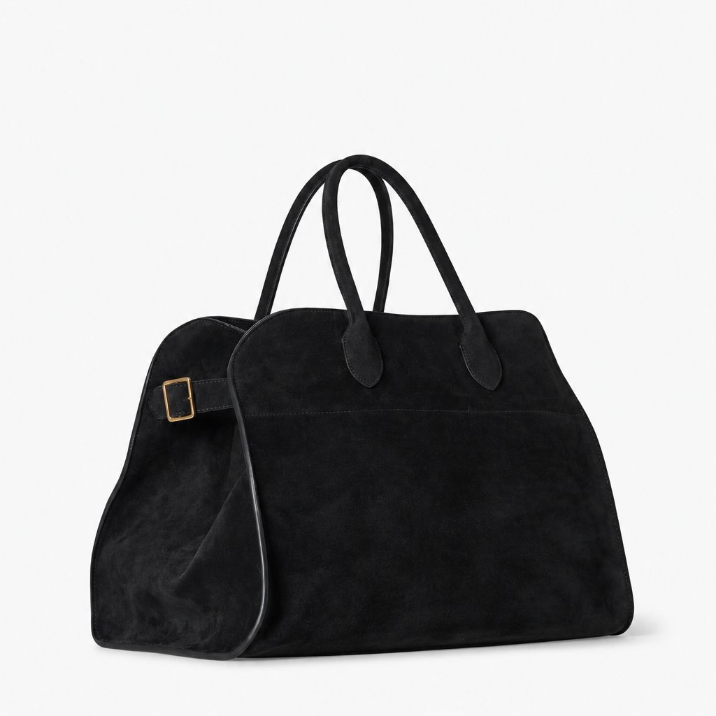 Margaux Suede Carryall Bag in Black - Side View with Gold Buckle