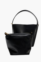 black structured bucket bag with matching pouch