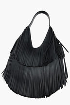 black fringe tote bag flat lay women statement
