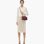 women wearing woven mini crossbody bag shoulder street style elegant