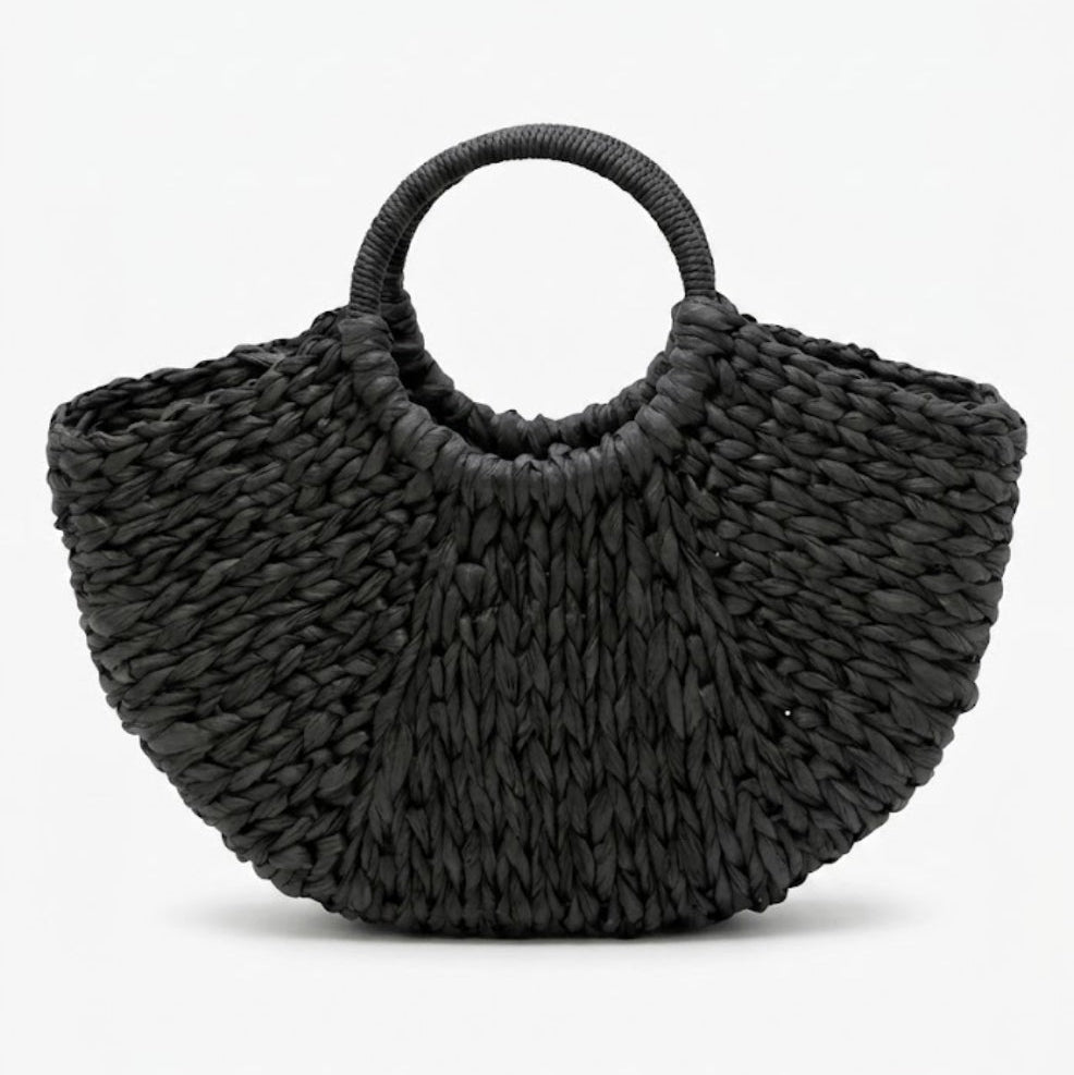 black crescent straw bag front view with round handles