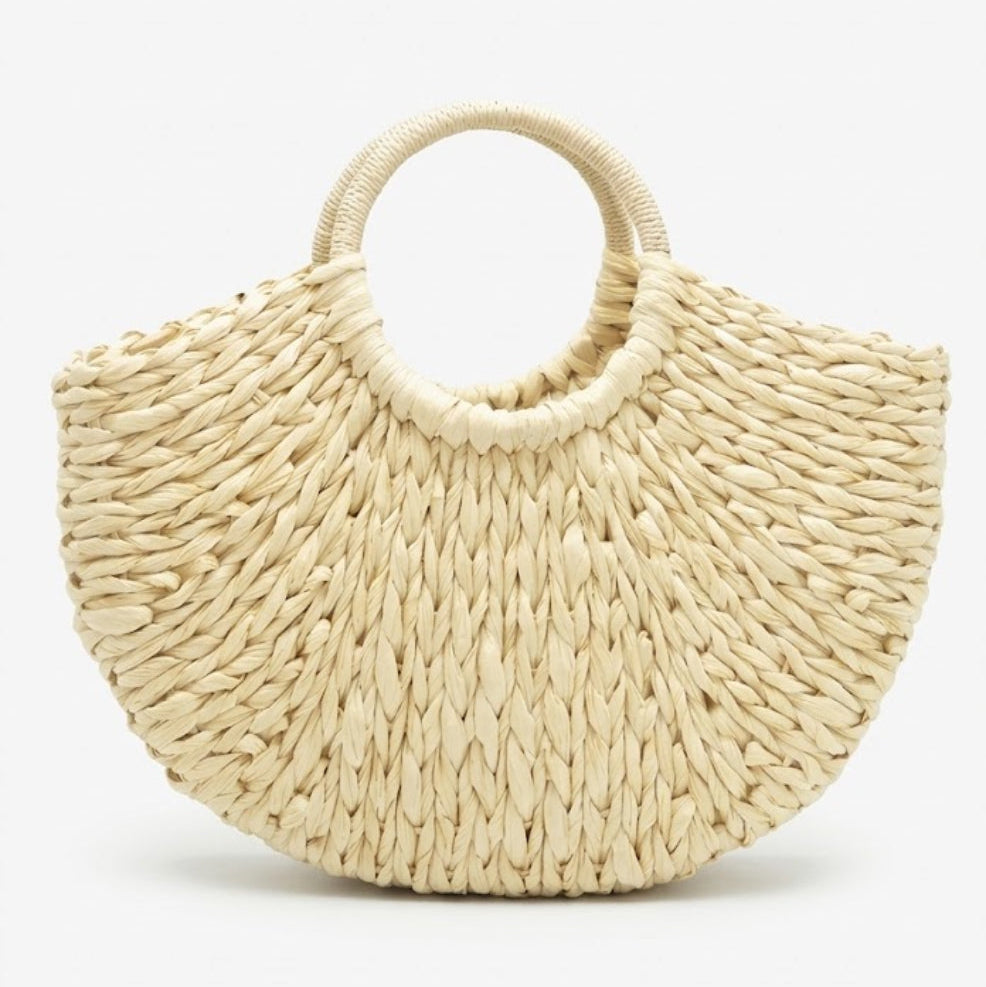 cream crescent straw bag front view with round handles
