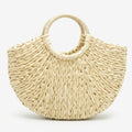 cream crescent straw bag front view with round handles