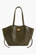 An olive green leather tote bag with double shoulder straps and a gold-tone turn-lock closure on the front, displayed against a clean off-white background.