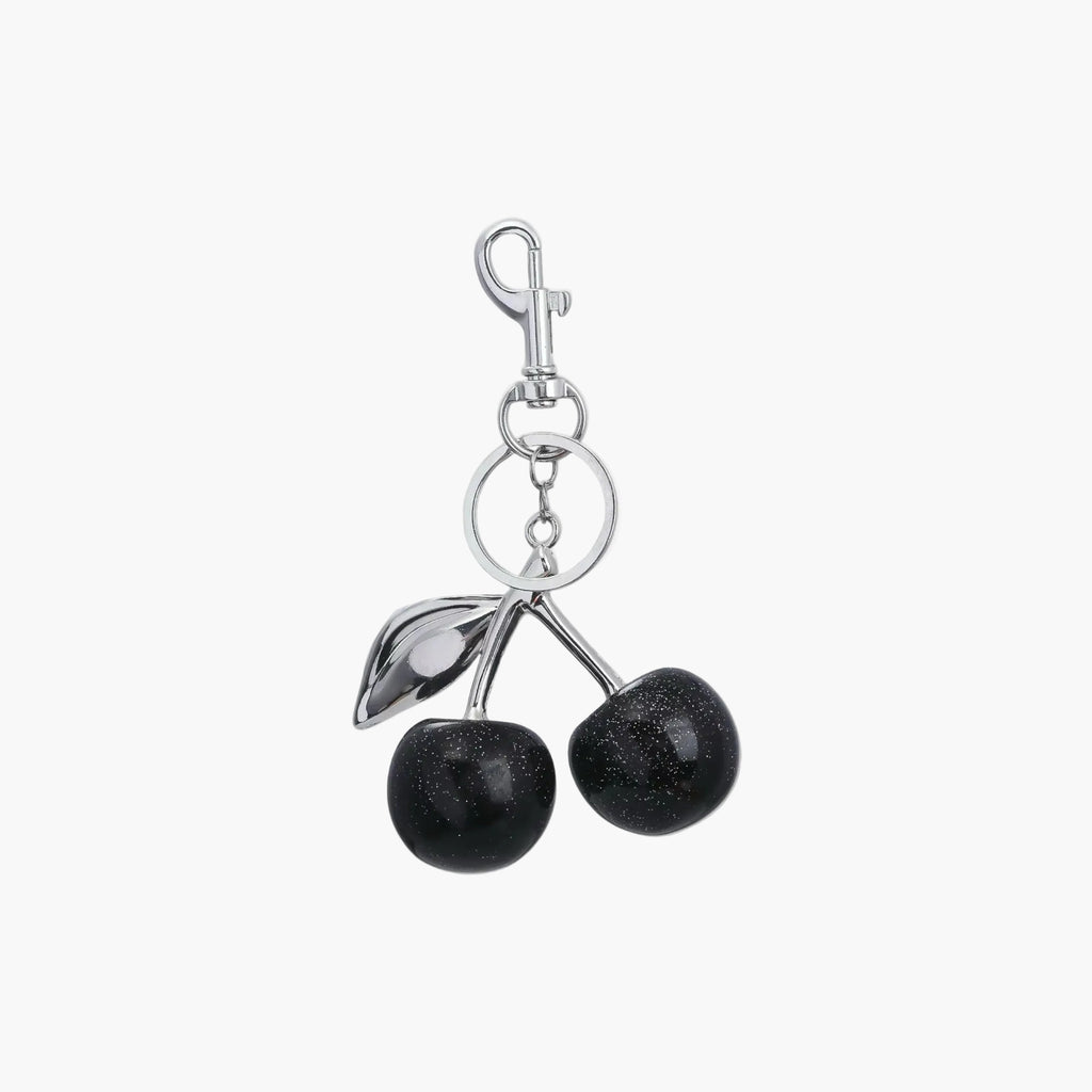 Black cherry-shaped keychain with silver clip on a white background