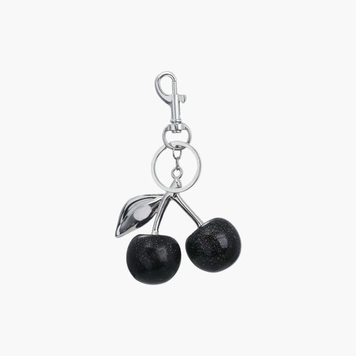 Black cherry-shaped keychain with silver clip on a white background