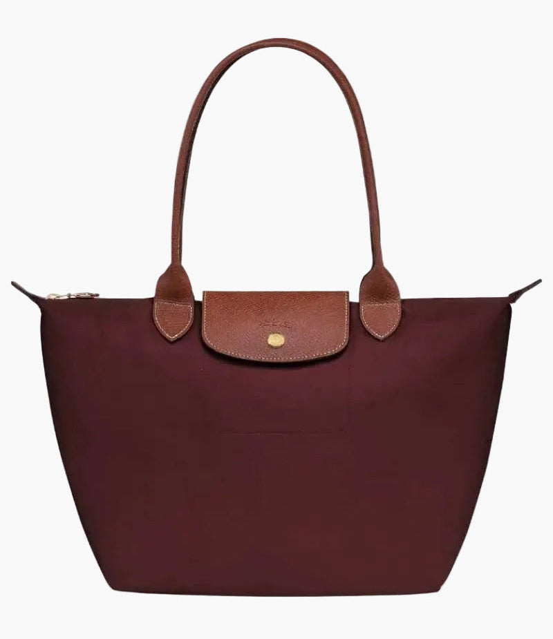 Le Pliage Medium Tote Bag Buegundy with long shoulder handles and gold-tone hardware