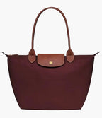 Le Pliage Medium Tote Bag Buegundy with long shoulder handles and gold-tone hardware