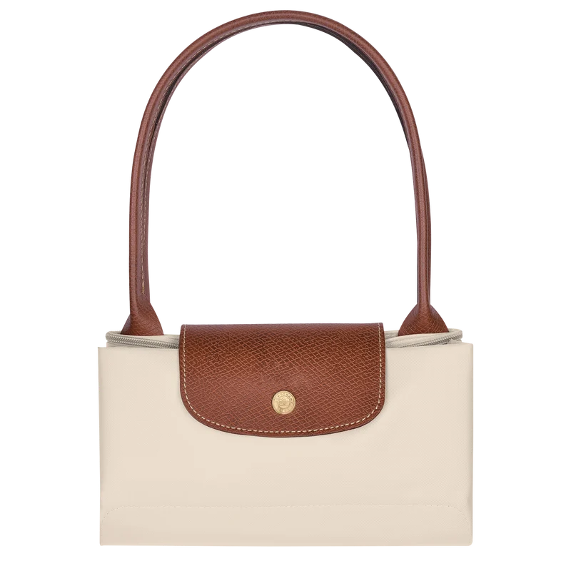 Le Pliage Medium Tote Bag in Paper folded into a compact size for travel and storage