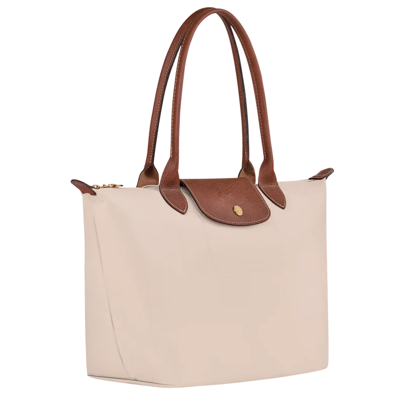 Le Pliage Medium Tote Bag in Paper side view showing brown trim and lightweight foldable design