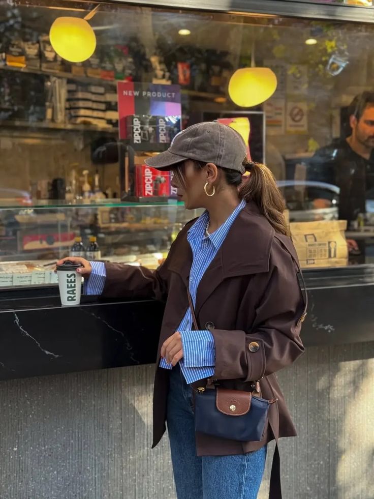 Le Pliage Mini Pouch in Navy worn crossbody for a city café look