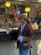 Le Pliage Mini Pouch in Navy worn crossbody for a city café look