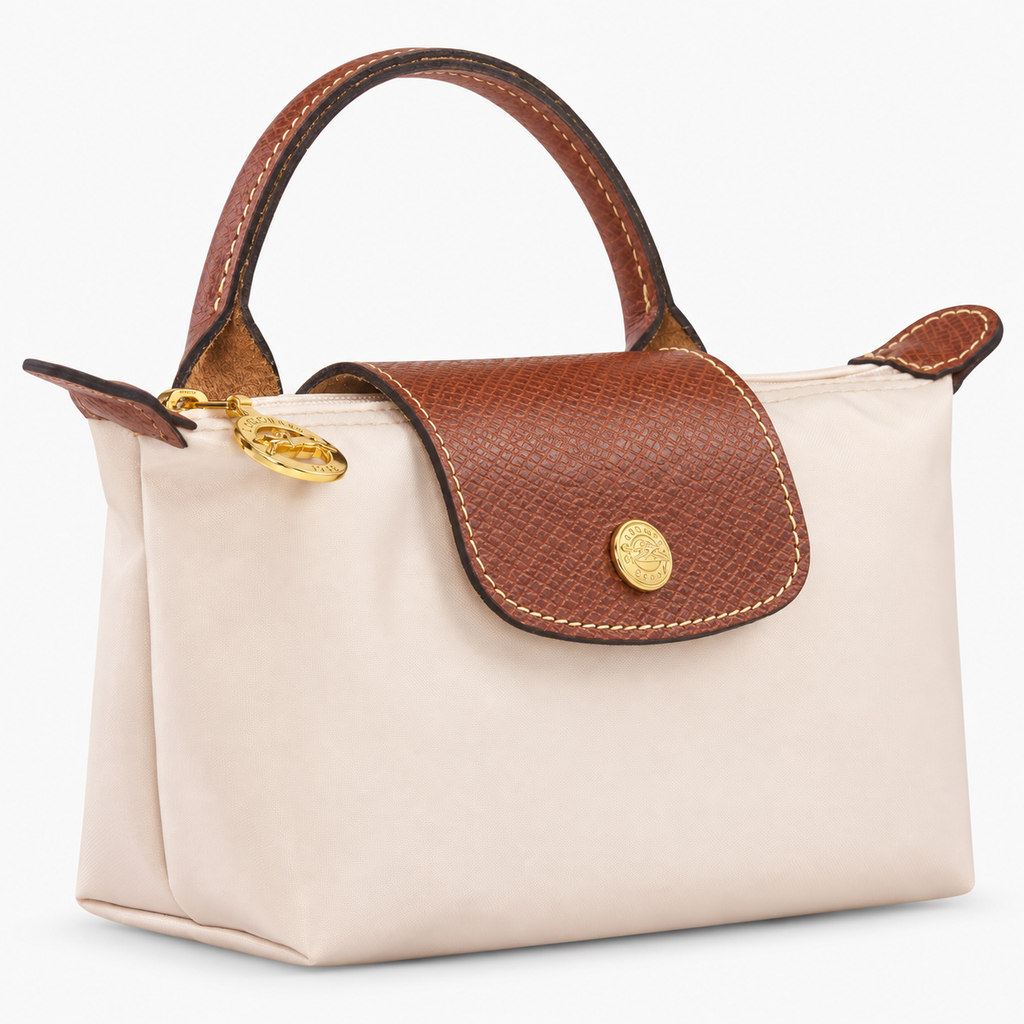 Le Pliage Mini Pouch in Navy, three-quarter view with brown trim