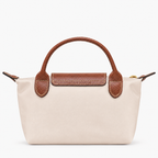 Le Pliage Mini Pouch in Paper beige, back view with brown handles