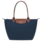 Pliage Medium Tote Bag in navy blue with brown handles and gold-tone hardware