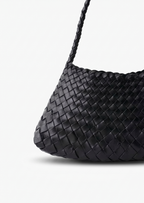 black woven shoulder bag front angle view with braided strap