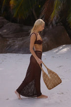 woman walking on beach with wooden bead tote bag summer style natural tan - tan - tote bag