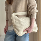women wearing woven hobo shoulder bag beige street style elegant