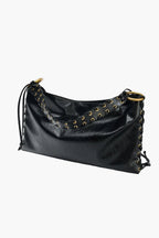black corset shoulder bag side view braided handle women structured