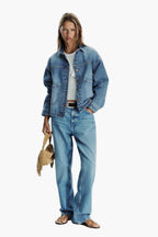 women wearing sand fringe faux suede shoulder bag jeans street style boho
